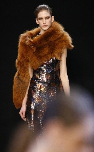 A model presents a creation by French-Swedish designer Marcel Marongiu for Guy Laroche during the autumn-winter 2010/2011 ready-to-wear collection show in Paris, capital of France, March 8, 2010. 