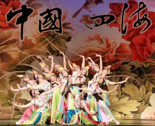 Chinese dancers perform at the Massey Hall in Toronto, Canada, on March 7, 2010. A dazzling performance was staged by the Chinese troupe to celebrate the Spring Festival. 