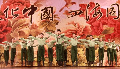 Chinese dancers perform at the Massey Hall in Toronto, Canada, on March 7, 2010. A dazzling performance was staged by the Chinese troupe to celebrate the Spring Festival. 