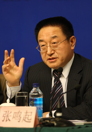 Zhang Mingqi, deputy president of the All-China Federation of Trade Unions, answers questions during a press conference on the function of Chinese trade unions during the transformation of the pattern of economic development held on the sidelines of the Third Session of the 11th National People's Congress in Beijing, China, March 9, 2010. (Xinhua/Yuan Man)