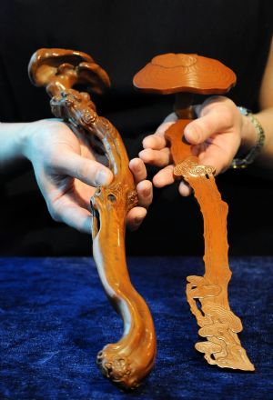 The photo taken on March 9, 2010 shows a boxwood imperial 'Lingzhi' ruyi scepter made during Qing dynasty (1644-1911), with an estimated value between 5-7 million HK dollars, in Hong Kong, south China.