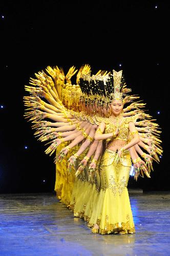Artists from the China Disabled People's Performing Art Troupe perform 'Thousand-hand Bodhisattva' dance during the 'My Dream' show in Amman, Jordan, March 8, 2010.