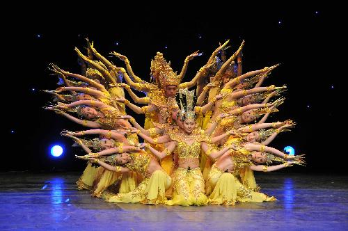 Artists from the China Disabled People's Performing Art Troupe perform 'Thousand-hand Bodhisattva' dance during the 'My Dream' show in Amman, Jordan, March 8, 2010.