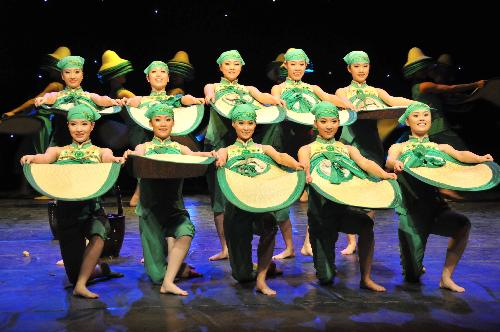 Artists from the China Disabled People's Performing Art Troupe perform 'Green Seedlings' dance during the 'My Dream' show in Amman, Jordan, March 8, 2010. 