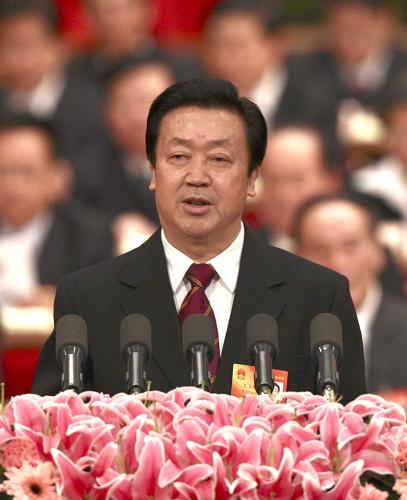 China's top judge Wang Shengjun delivers a report on the work of the Supreme People's Court at a meeting of the annual parliament session Thursday. [Xinhua]