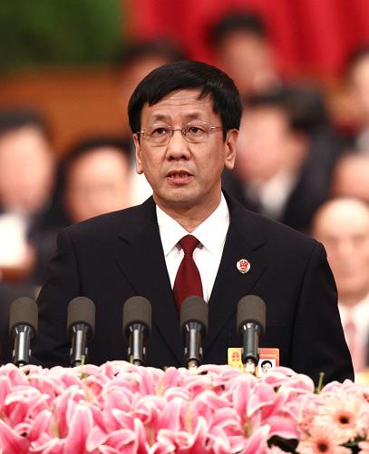 Cao Jianming delivers a report on the work of the Supreme People's Procuratorate at a meeting of the annual parliament session Thursday. [Xinhua]