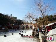 Located in the Summer Palace in Beijing, Suzhou Street was built in the style of South China (Jiangsu and Zhejiang) towns in 1750 during the Qing Dynasty; it is a place where the emperors and empresses took their leisurely strolls. The street is the most visited attraction in the Summer Palace. [Photo by Zhao Xiaobo]
