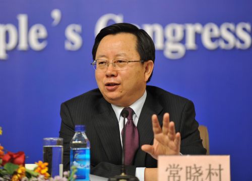 Chang Xiaocun, director of market system development department with the Ministry of Commerce (MOFCOM), speaks during a press conference on 'Activating Circulation and Promoting consumption' held on the sidelines of the Third Session of the 11th National People's Congress in Beijing, China, March 13, 2010. (Xinhua/Ma Yan)