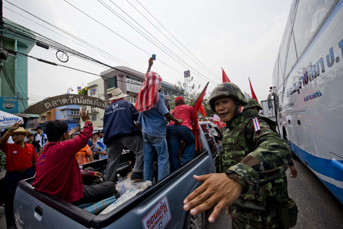 Members of &apos;red-shirts&apos;, supporters of the United Front for Democracy against Dictatorship (UDD), travel to Bangkok, capital of Thailand, March 13, 2010. The demonstration organized by the UDD started on Friday when the red-shirted supporters of fugitive former Prime Minister Thaksin Shinawatra are traveling to Bangkok. [Lui Siu Wai/Xinhua]