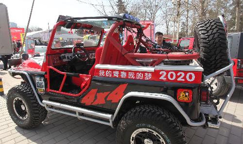 The photo taken on March 12, 2010 shows a performance-tuned cross-country vehicle exhibited at the performance-tuned vehicle exhibition in Beijing, China. [Luo Wei/Xinhua]