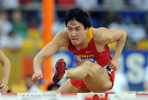 China's Liu Xiang competes in the men's first round 60m hurdles at the 2010 IAAF World Indoor Athletics Championships in Doha, capital of Qatar, on March 12, 2010. Liu advanced into the semifinal with 7.79 seconds. [Chen Shaojin/Xinhua]