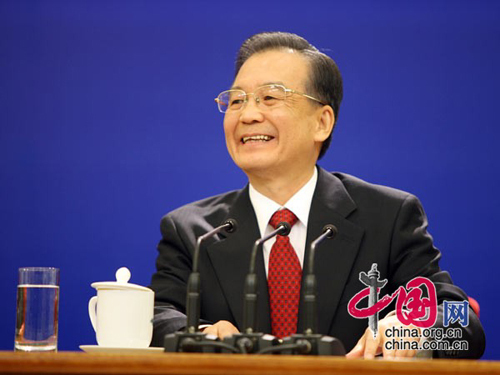 Chinese Premier Wen Jiabao meets the press at the news conference after the closing meeting of the Third Session of the 11th National People's Congress (NPC) at the Great Hall of the People in Beijing on March 14, 2010.