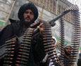 30 militants defect to gov't in W. Afghanistan