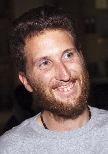 Released French aid worker Olivier Frappe from Triangle aid organisation smiles after a medical check in Sudan's capital Khartoum, March 14, 2010. Two French aid workers kidnapped in the Central African Republic last year were freed in Sudan's Darfur region on Sunday, after more than 100 days in captivity. [Xinhua]