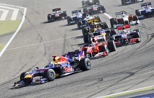 F1 competitors drive during the Bahrain F1 Grand Prix at Sakhir circuit in Manama March 14, 2010. Ferrari's Spanish driver Fernando Alonso won his Ferrari debut with 1h 39m 20.396s. (Xinhua/Zhang Ning)