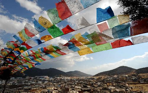 Photo taken on March 12, 2010 shows a view of Dukezong ancient city of Shangri-la County, southwest China's Yunnan Province. Dukezong, which has a history of 1,300 years, means 'Moonlight City' in the Tibetan language. [Xinhua/Lin Yiguang]