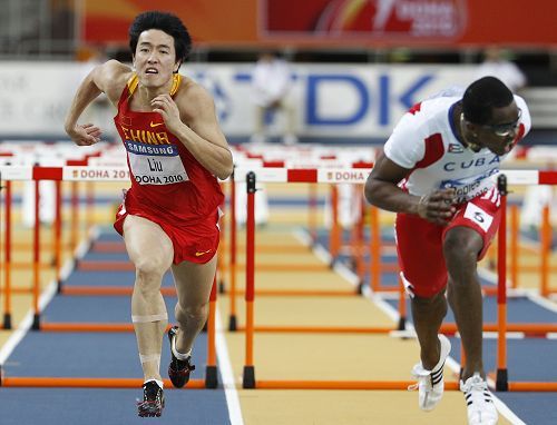 Liu Xiang competes during the men's 60 meters hurdles event at the IAAF World Indoor Athletics Championships at the Aspire Dome in Doha March 14, 2010. 