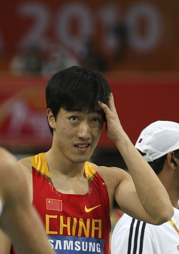 Liu Xiang competes during the men's 60 meters hurdles event at the IAAF World Indoor Athletics Championships at the Aspire Dome in Doha March 14, 2010.