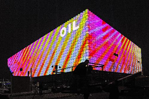 Oil Pavilion of World Expo illuminated in test run