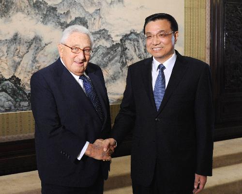 Chinese Vice Premier Li Keqiang (R) meets with former U.S. Secretary of State Henry Kissinger in Beijing, capital of China, March 15, 2010. [Huang Jingwen/Xinhua] 