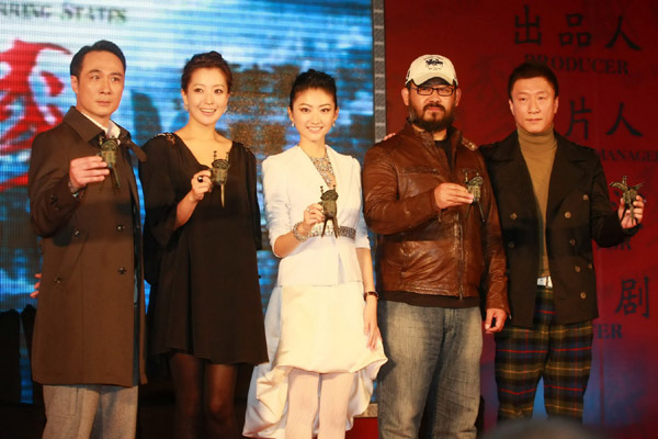 Cast members (L-R) Francis Ng, Kim Hee-Sun, Jing Tian, Jiang Wu, and Sun Honglei pose at a press conference for the new film 'Warring States' in Beijing on March 14, 2010. 