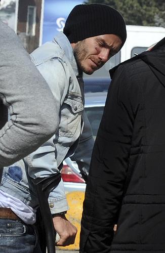 AC Milan's soccer player David Beckham arrives at the airport in Milan March 15, 2010. (Xinhua/Reuters) 