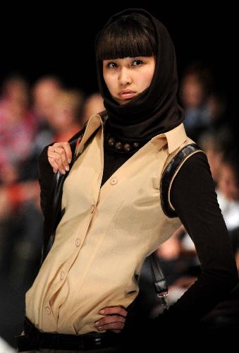 A model presents a creation during the Kyrgyz Fashion Week in Bishkek, capital of Kyrgyzstan, on March 17, 2010. 