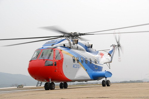 A giant AC313 helicopter starts to lift off during its debut flight in east China's Jiangxi province on March 18. [Photo/Chinanews.com.cn]