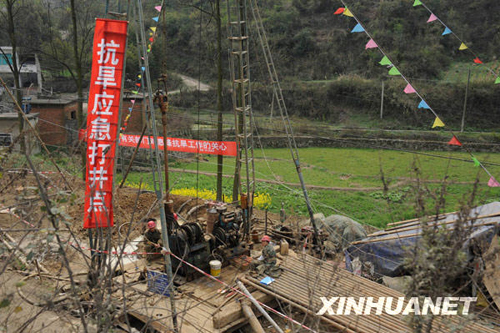 People are digging wells in Xinzhong Village, Xifeng County of southwest China&apos;s Guizhou Province, on March 17 to seek drinking water for people and livestock amid a prolonged drought.