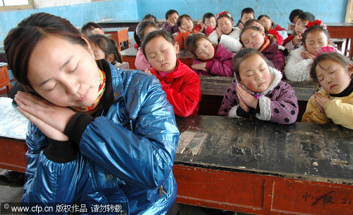 Children practice sleeping during a special 'sleep class' ahead of the World Sleep Day at a primary school in Nanyang city, Henan province. Students were taught different ways to improve their sleep quality. Started by the International Foundation for Mental Health and Neuro-Science in 2001 to raise awareness of sleeping disorders, World Sleep Day falls on March 21 every year.