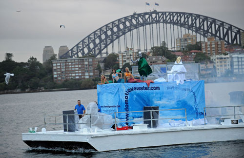 Marine biologists dress up as Mermainds and SeaGod and sit on a ship 'Iceberg' to mark World Water Day March 22, 2010, in Australia. This is the 18th World Water Day. UN-Water has chosen ''Clean Water for a Healthy World' as theme for World Water Day 2010. [Xinhua/AFP]