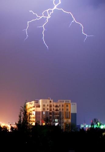 Photo taken early March 21, 2010 shows a thunder flash lighting up the sky over Luoping County, southwest China's Yunnan Province.