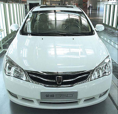 Finished Roewe 350 compact sedan emerges from the production line.