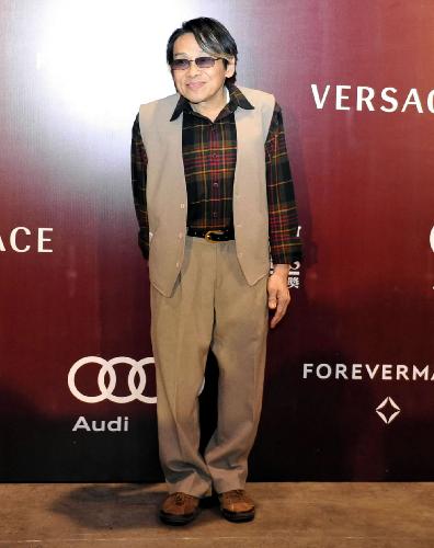 Actor Teddy Robin Kwan poses while attending the Asian Film Awards in Hong Kong, south China, on March 22, 2010. 