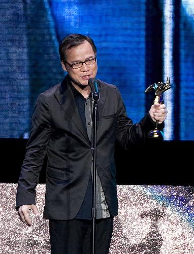 Singer Lo Tayu addresses the awarding ceremony after winning the best original music award at the Asian Film Awards in Hong Kong, south China, on March 22, 2010. 