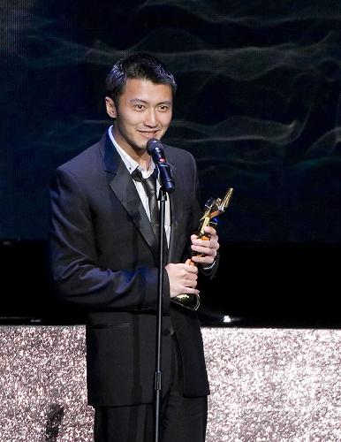 Actor Nicholas Tse addresses the awarding ceremony after winning the Best Supporting Actor award at the Asian Film Awards in Hong Kong, south China, on March 22, 2010. 