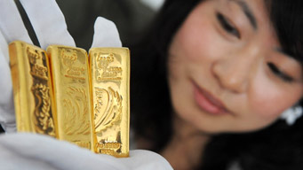 Shanghai Expo issues gold bars