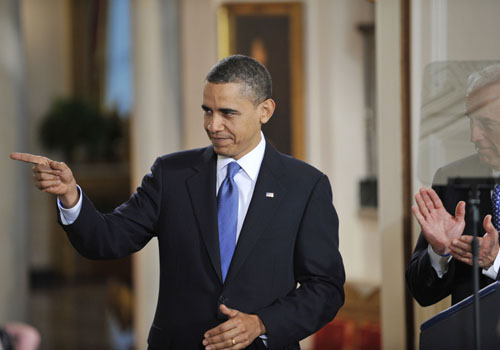 U.S. President Barack Obama gestures during a ceremony to sign the healthcare reform bill at the White House in Washington D.C., capital of the United States, March 23, 2010. [Zhang Jun/Xinhua]