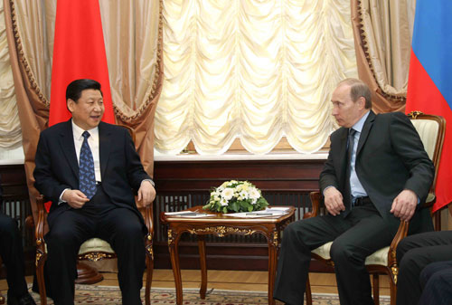 Chinese Vice President Xi Jinping (R) meets with Russian Prime Minister Vladimir Putin in Moscow, capital of Russia, March 23, 2010. [Rao Aimin/Xinhua]