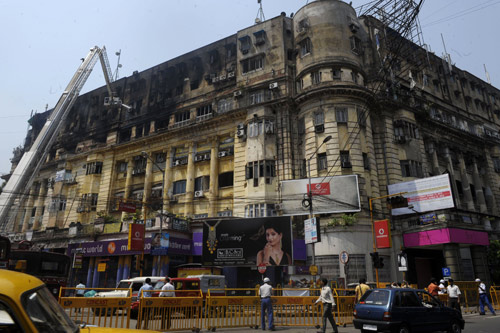 At least 24 people died and 40 others were injured when a fire engulfed a landmark building in the heart of the eastern Indian city of Kolkata. (Xinhua/AFP)