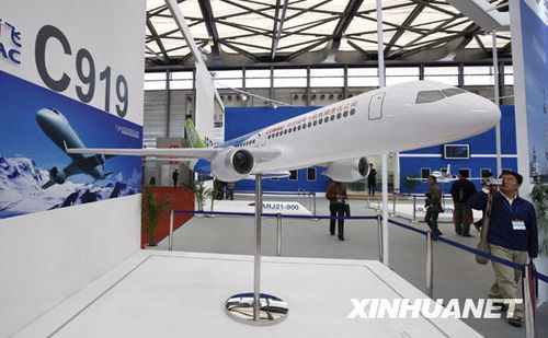 A mockup of China's homemade jumbo jet, C919, the major project of the Commercial Aircraft Corporation of China (COMAC), is displayed at the China International Industry Fair (CIIF) on November 3, 2009, in Shanghai. [Xinhua]