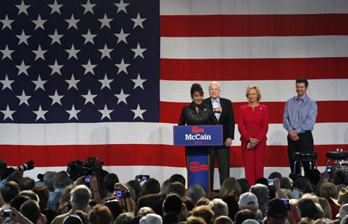 Former Alaska governor and vice presidential candidate Sarah Palin (L) speaks as U.S. Senator John McCain (R-AZ), his wife Cindy McCain (2nd R) and Todd Palin (R) listen during a campaign rally at the Pima County Fairgrounds in Tucson, Arizona March 26, 2010.