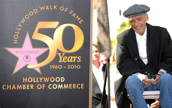 US actor Dennis Hopper listens to the speech of actor Viggo Mortensen after being honored with a star on the Hollywood Walk of Fame in Hollywood on March 26, 2010. Hopper, who starred in such cinematic classics as 'Easy Rider' and 'Apocalypse Now,' is dying of cancer, his lawyer said.