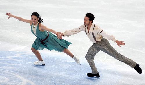 Federica Faiella (L) and Massimo Scali of Italy perform during the ice dance free dance event at the ISU World Figure Skating Championships in Turin, Italy, March 26, 2010. Faiella/Scali won the bronze medals with 197.85 points. 