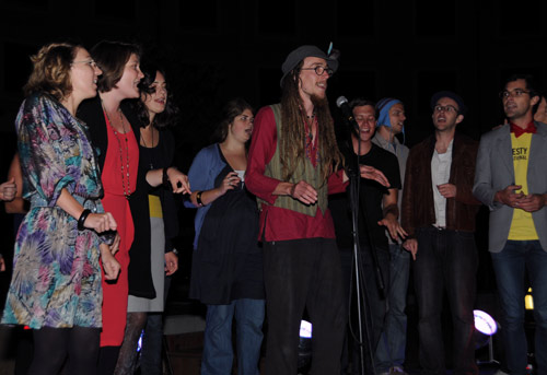 Young people perform at an environment protection concert in Wellington, capital of New Zealand, March 27, 2010. Wellington has joined 4,000 cities plunged into darkness on Saturday night as hundreds of millions of people around the world turned off their lights for Earth Hour.