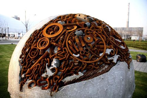 Photo taken on March 26, 2010 shows a sculpture made of waste nails and gears at the Expo Park in Shanghai, east China. The Expo Park will be put into trial operation in the end of April.