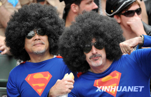 Fans pose for photos at the Hong Kong Sevens rugby event, March 27, 2010.