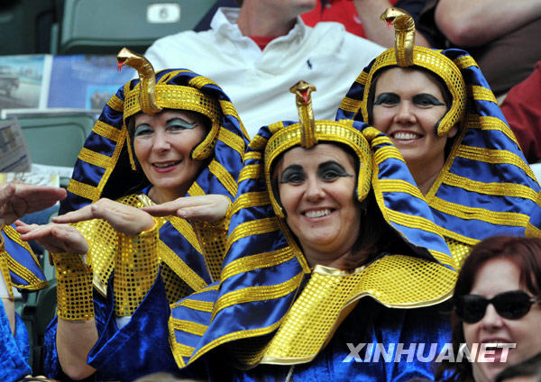 Fans pose for photos at the Hong Kong Sevens rugby event, March 27, 2010.