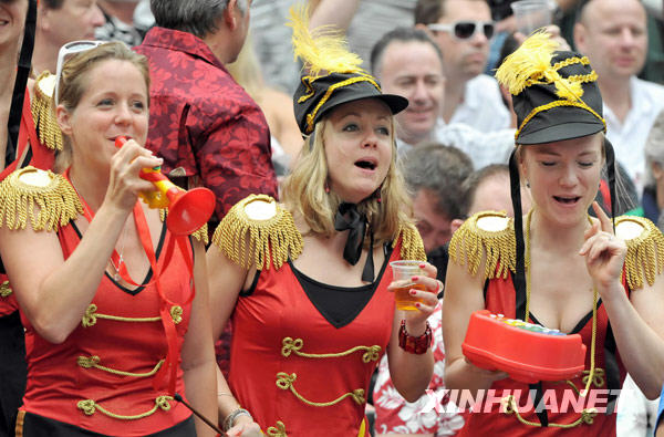 Fans pose for photos at the Hong Kong Sevens rugby event, March 27, 2010.