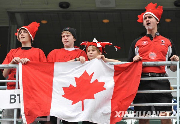 Fans pose for photos at the Hong Kong Sevens rugby event, March 27, 2010.